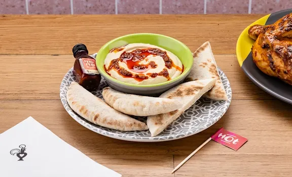 Creamy Hummus with peri-peri drizzle&pita
- Snacks Nando's Menu